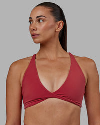 Woman wearing Agile Sports Bra - Claret | Thumbnail Index: 0