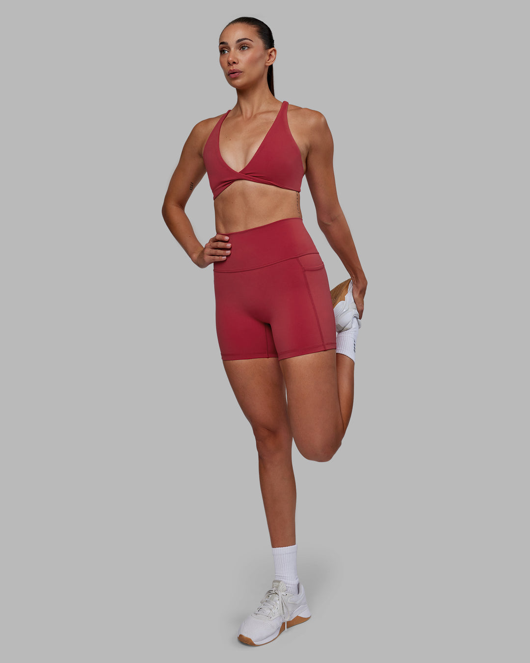 Woman wearing Agile Sports Bra - Claret - view 5