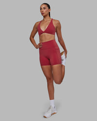 Woman wearing Agile Sports Bra - Claret | Thumbnail Index: 4