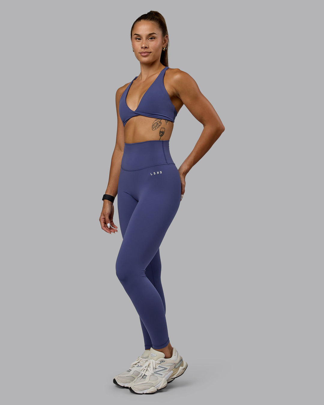 Woman wearing Agile Sports Bra - Future Dusk - view 3