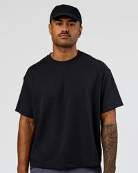 Man wearing All Day Cap in Black | Thumbnail Index: 2