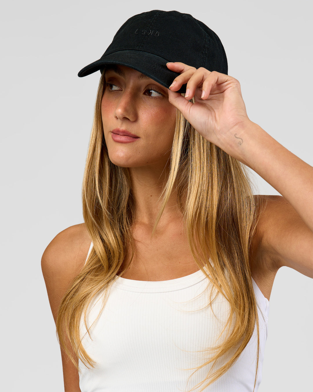 Woman wearing All Day Cap in Black - view 2