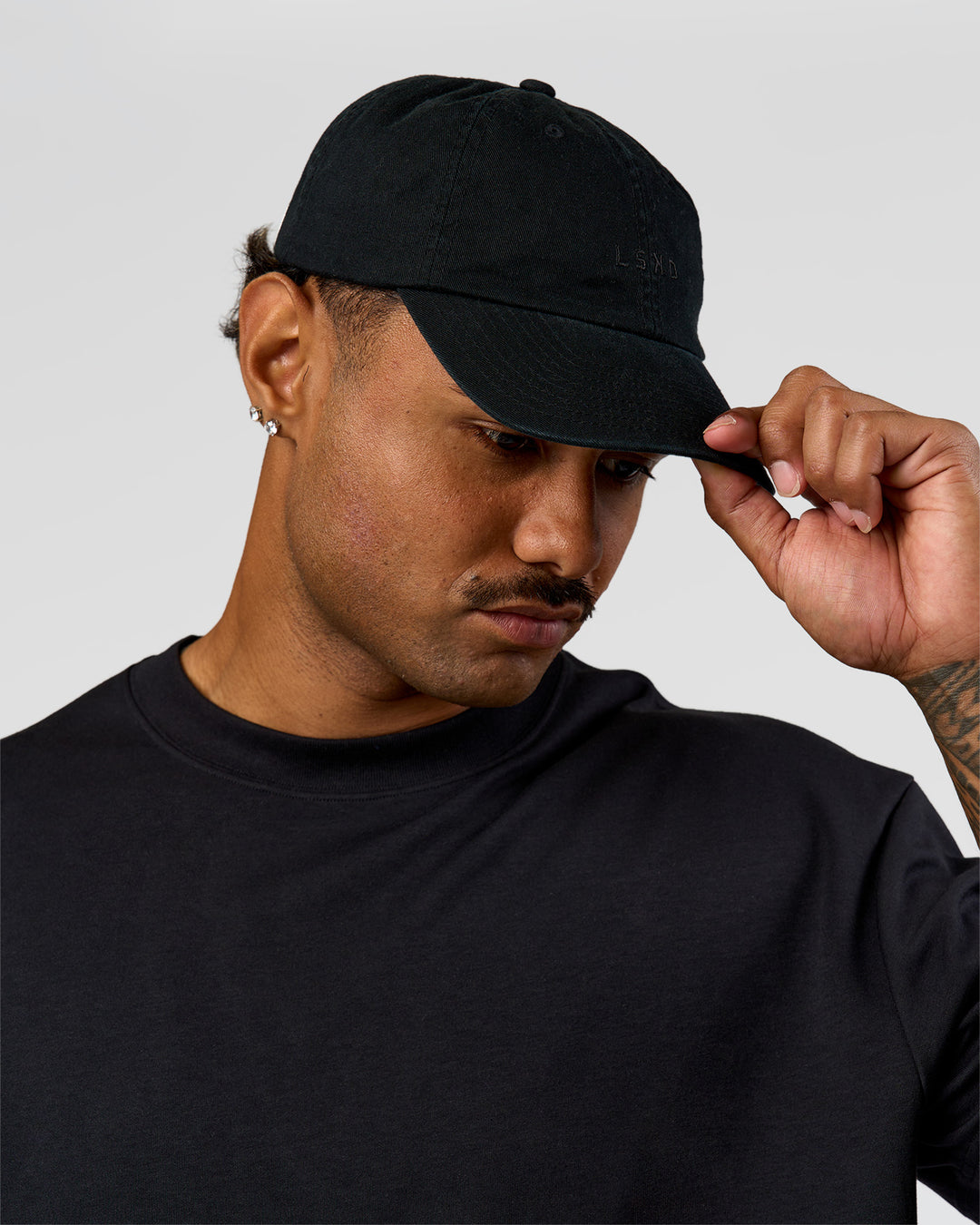 Man wearing All Day Cap in Black - view 5