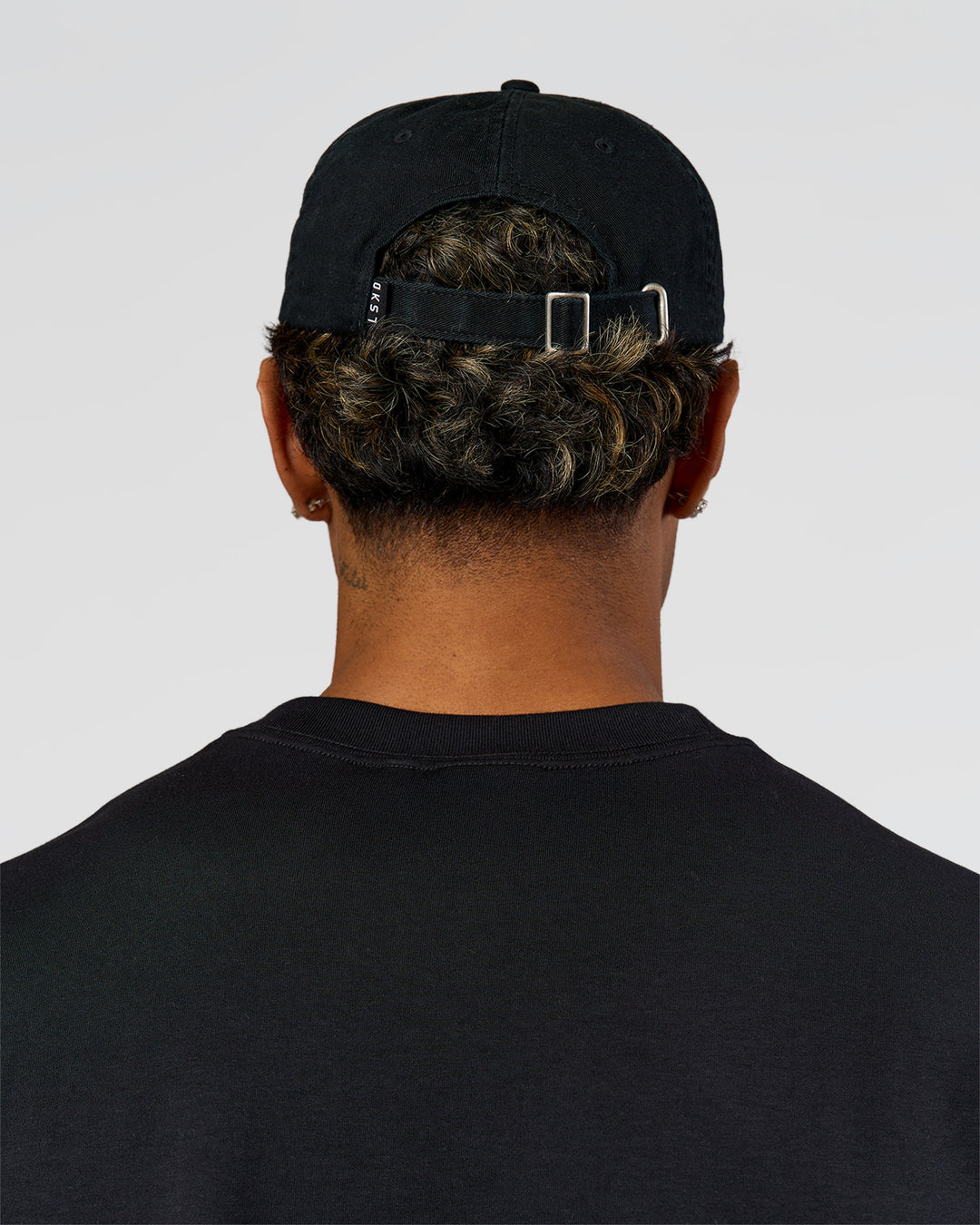 Man wearing All Day Cap in Black - view 7
