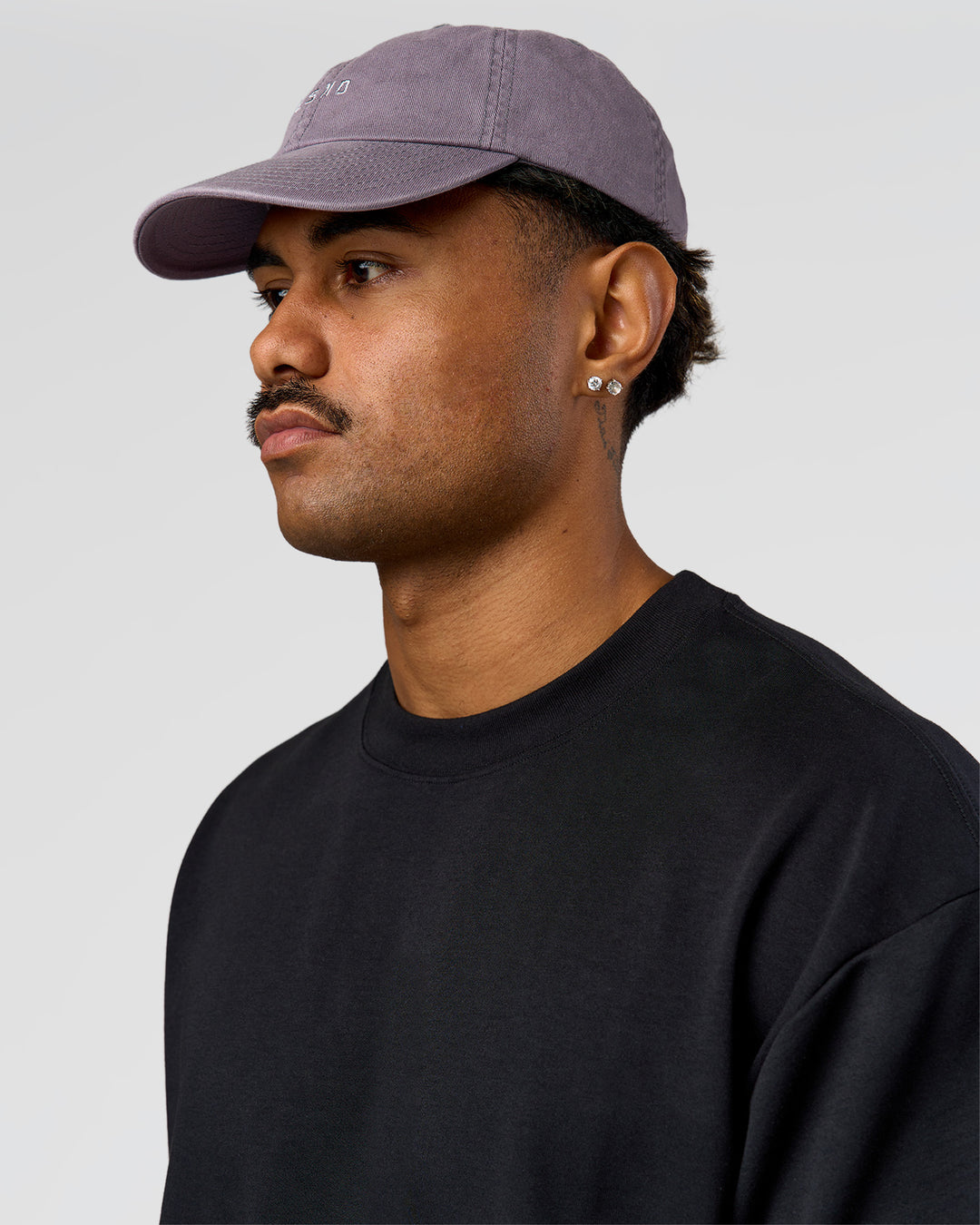 Man wearing All Day Cap in Duskstone - view 1