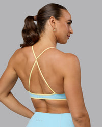Woman wearing Ambience Sports Bra - Crystal Blue-Lemon | Thumbnail Index: 5
