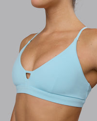 Woman wearing Ascend Sports Bra - Crystal Blue | Thumbnail Index: 6