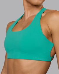 Woman wearing Aspire Sports Bra - Atlantis | Thumbnail Index: 6