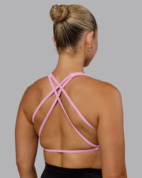 Woman wearing Aspire Sports Bra - Bubblegum | Thumbnail Index: 0
