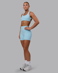 Woman wearing Aspire Sports Bra - Glacial Blue | Thumbnail Index: 2