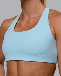 Woman wearing Aspire Sports Bra - Glacial Blue | Thumbnail Index: 5