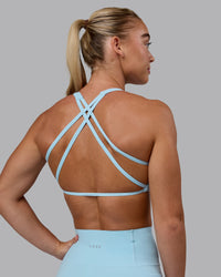 Woman wearing Aspire Sports Bra - Glacial Blue | Thumbnail Index: 4