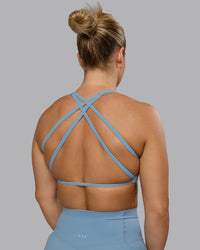 Woman wearing Aspire Sports Bra - Glacier Lake | Thumbnail Index: 3