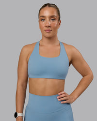 Woman wearing Aspire Sports Bra - Glacier Lake | Thumbnail Index: 4
