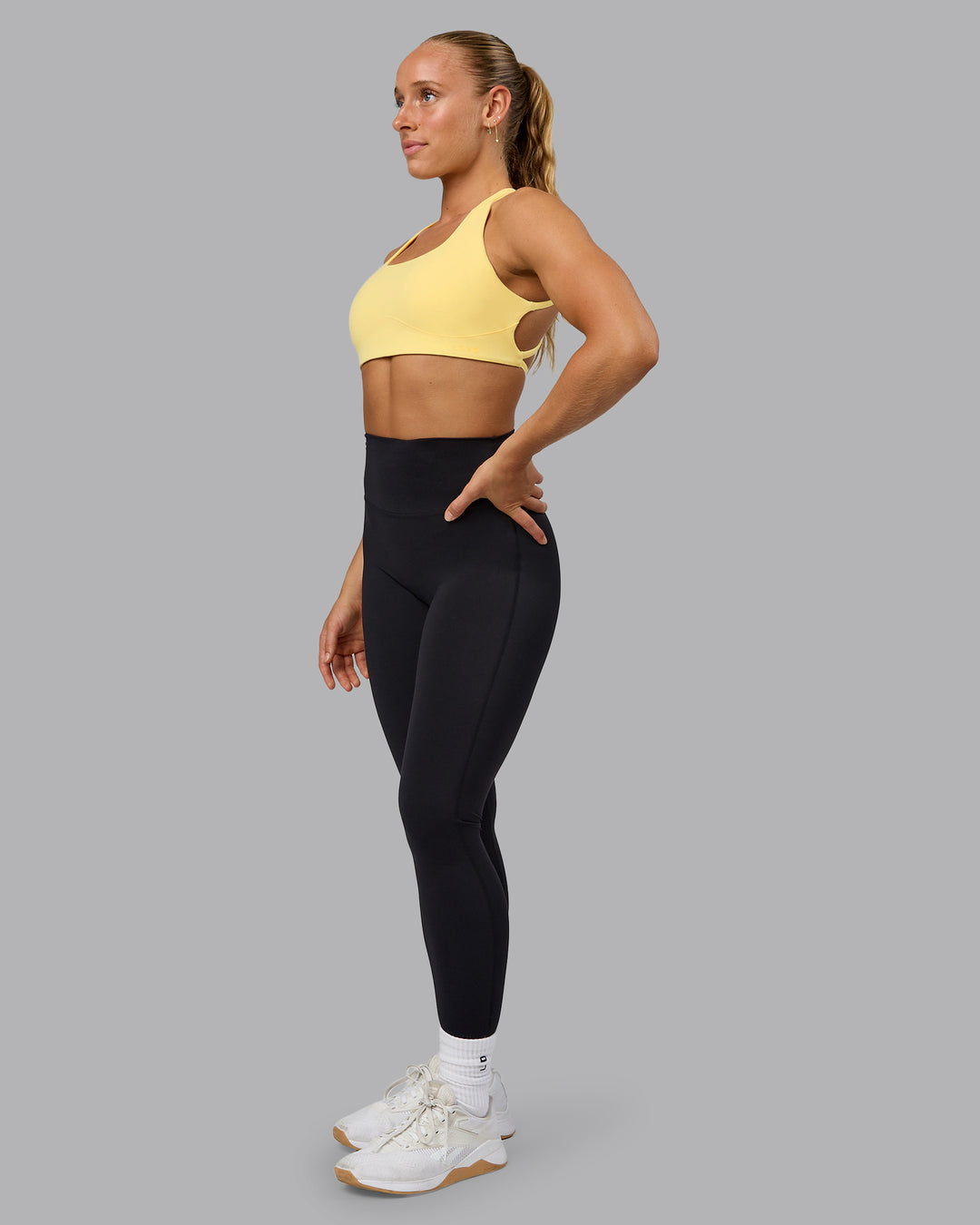 Woman wearing Aspire Sports Bra - Lemon - view 7