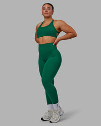 Woman wearing Aspire Sports Bra - Malachite | Thumbnail Index: 2