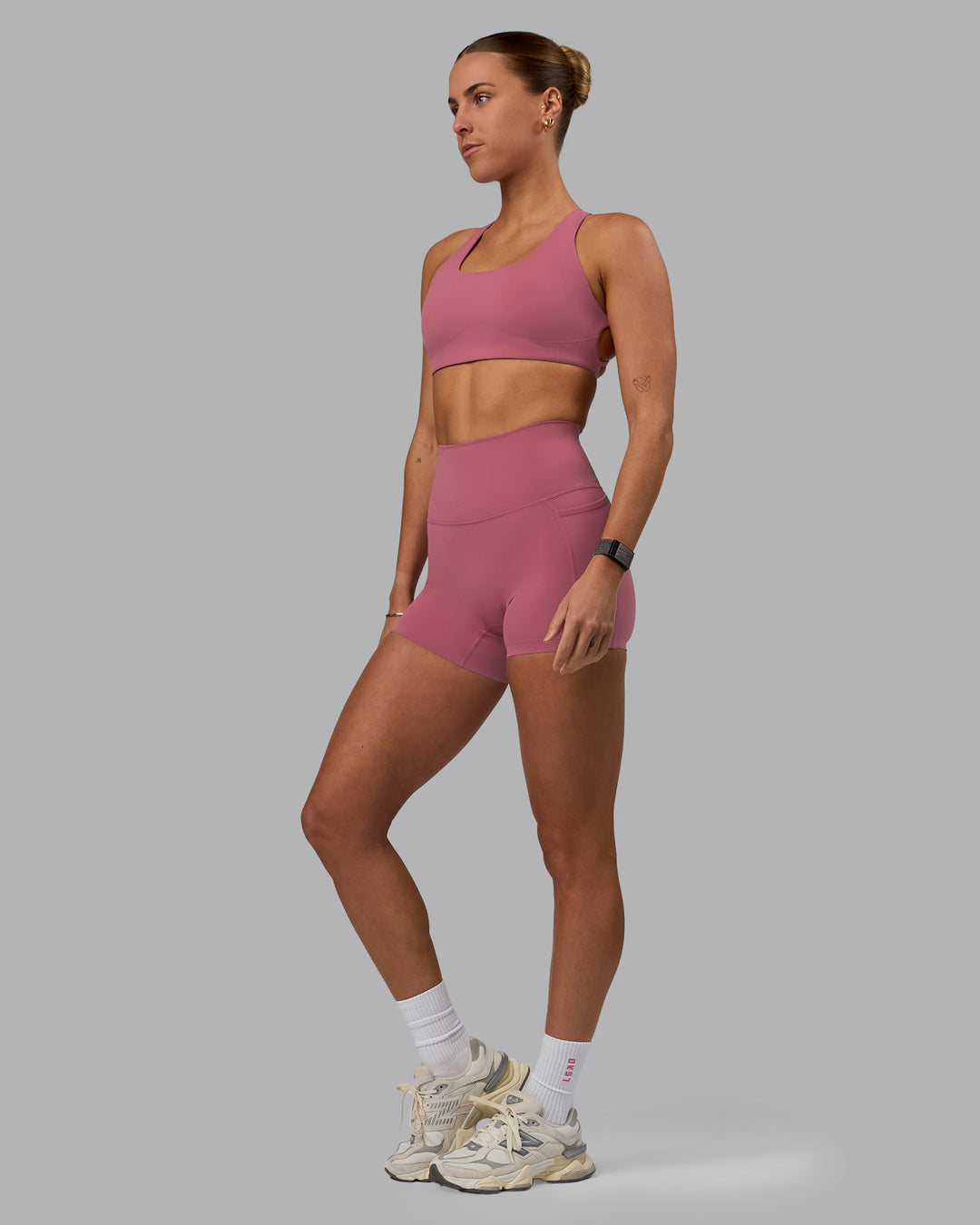 Woman wearing Aspire Sports Bra - Mauve Haze - view 5