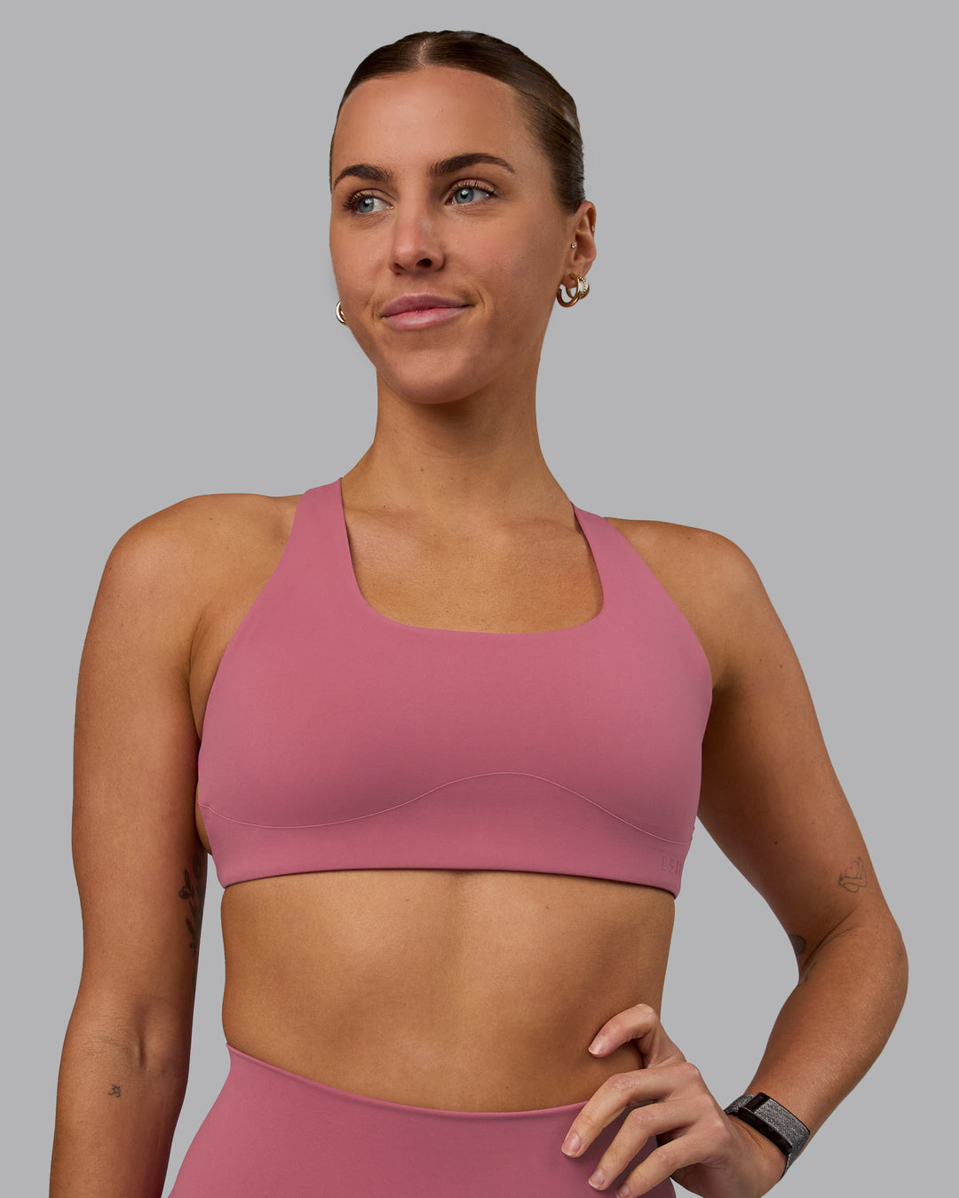 Woman wearing Aspire Sports Bra - Mauve Haze - view 4