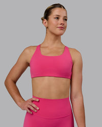 Woman wearing Aspire Sports Bra - Pink Flash | Thumbnail Index: 7