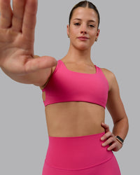 Woman wearing Aspire Sports Bra - Pink Flash | Thumbnail Index: 2