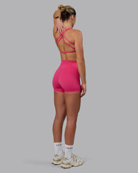 Woman wearing Aspire Sports Bra - Pink Flash | Thumbnail Index: 6