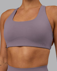 Woman wearing Aspire Sports Bra - Purple Sage | Thumbnail Index: 4