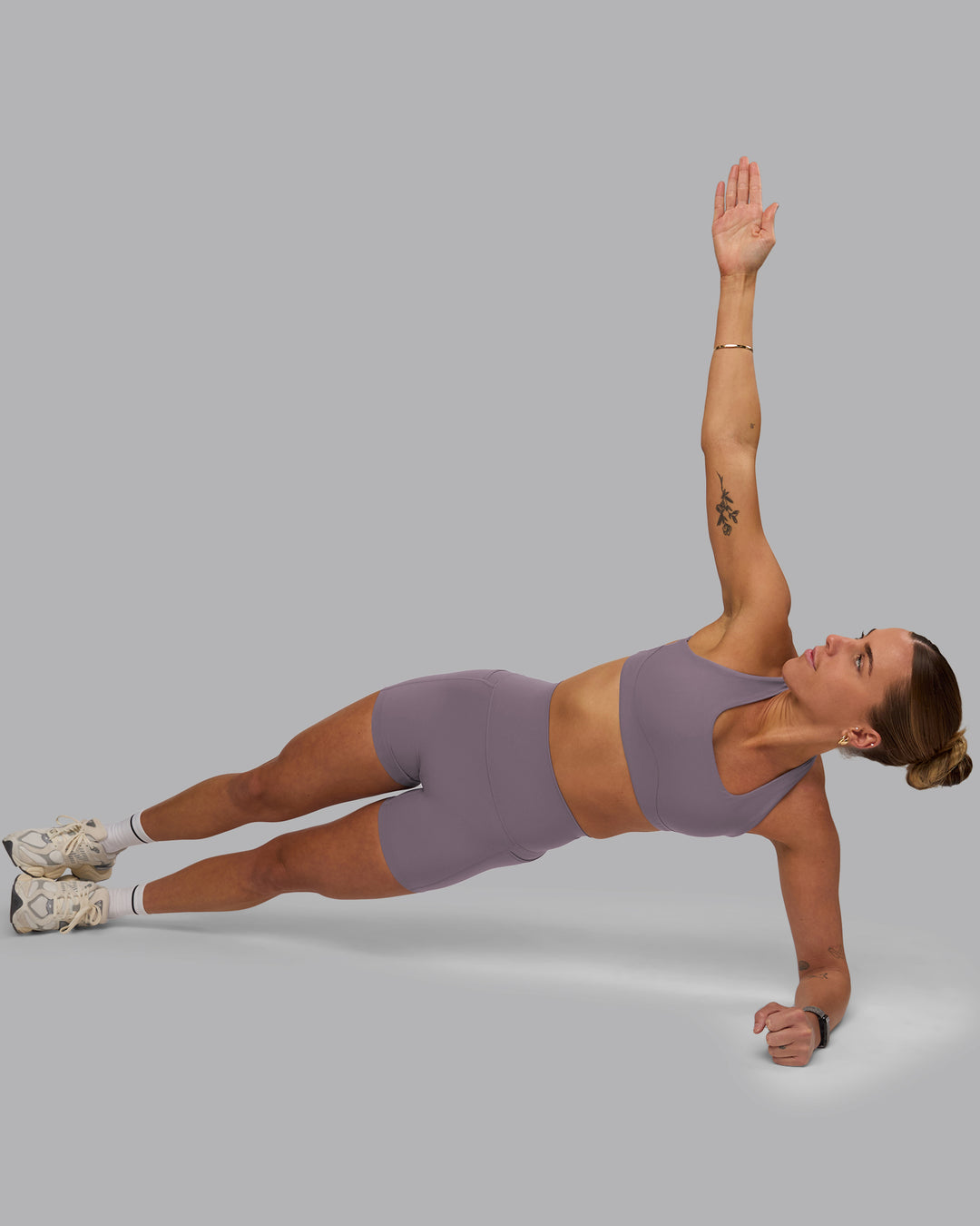 Woman wearing Aspire Sports Bra - Purple Sage - view 8