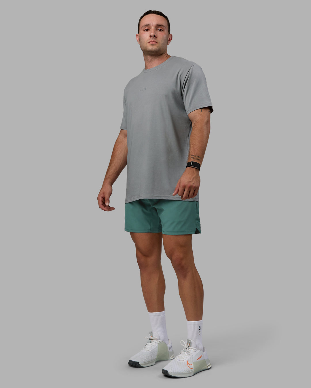 Man wearing Base FLXCotton Tee - Circular Grey - view 2