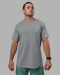 Man wearing Base FLXCotton Tee - Circular Grey | Thumbnail Index: 0