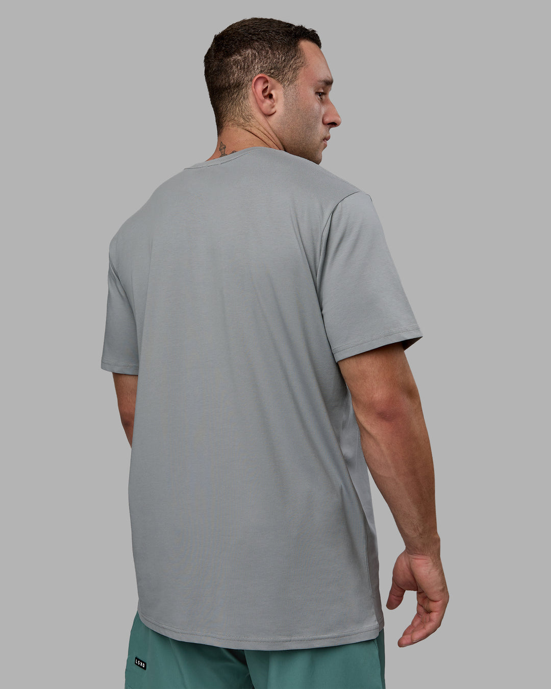 Man wearing Base FLXCotton Tee - Circular Grey - view 4