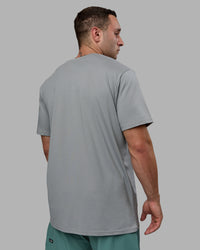 Man wearing Base FLXCotton Tee - Circular Grey | Thumbnail Index: 3