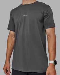 Man wearing Base FLXCotton Tee - Dark Storm | Thumbnail Index: 4