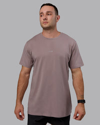 Man wearing Base FLXCotton Tee - Greyish Purple | Thumbnail Index: 1