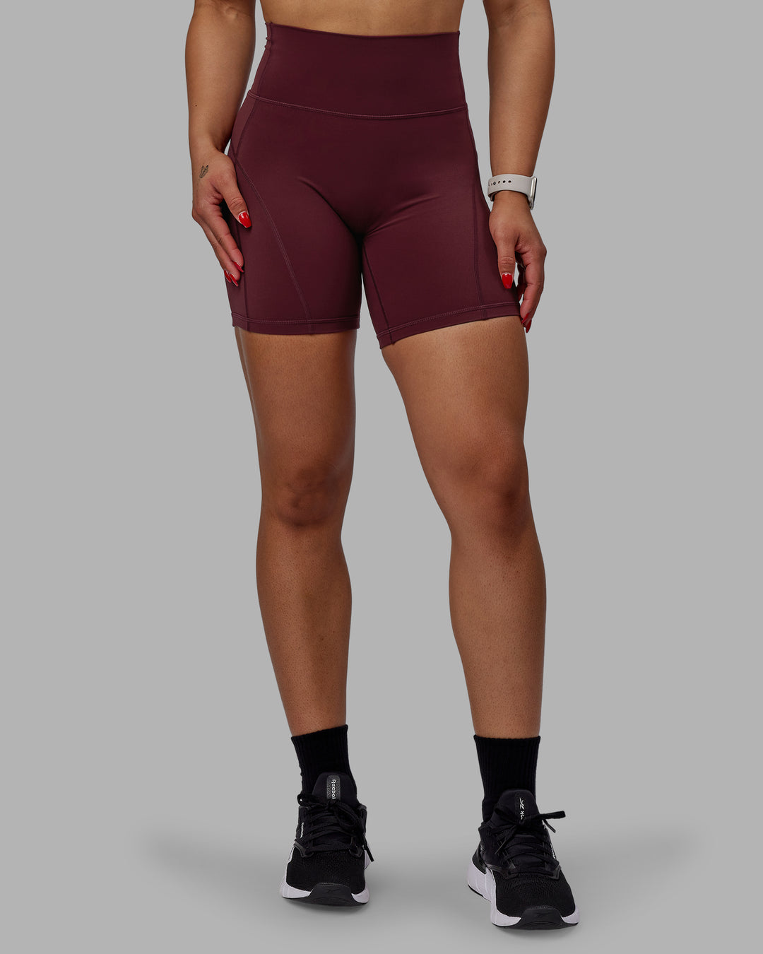 Woman wearing Bend Ultra High-Rise 6" Short - Dark Cherry - view 9