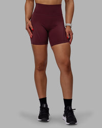 Woman wearing Bend Ultra High-Rise 6" Short - Dark Cherry | Thumbnail Index: 8