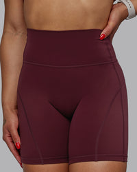 Woman wearing Bend Ultra High-Rise 6" Short - Dark Cherry | Thumbnail Index: 0
