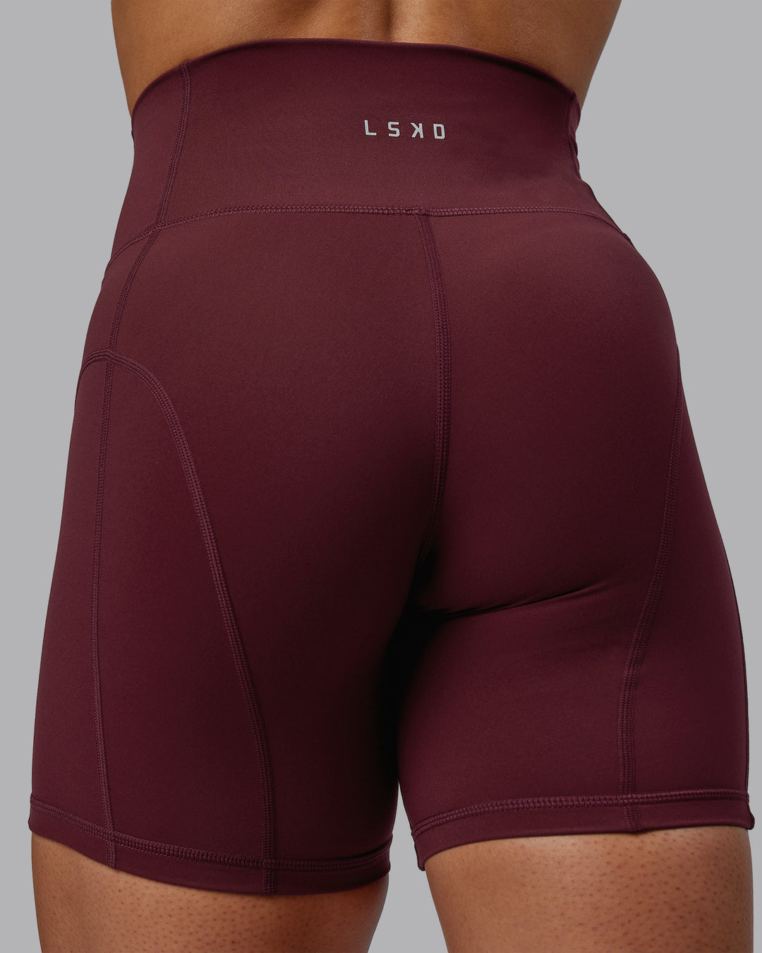 Woman wearing Bend Ultra High-Rise 6" Short - Dark Cherry - view 8