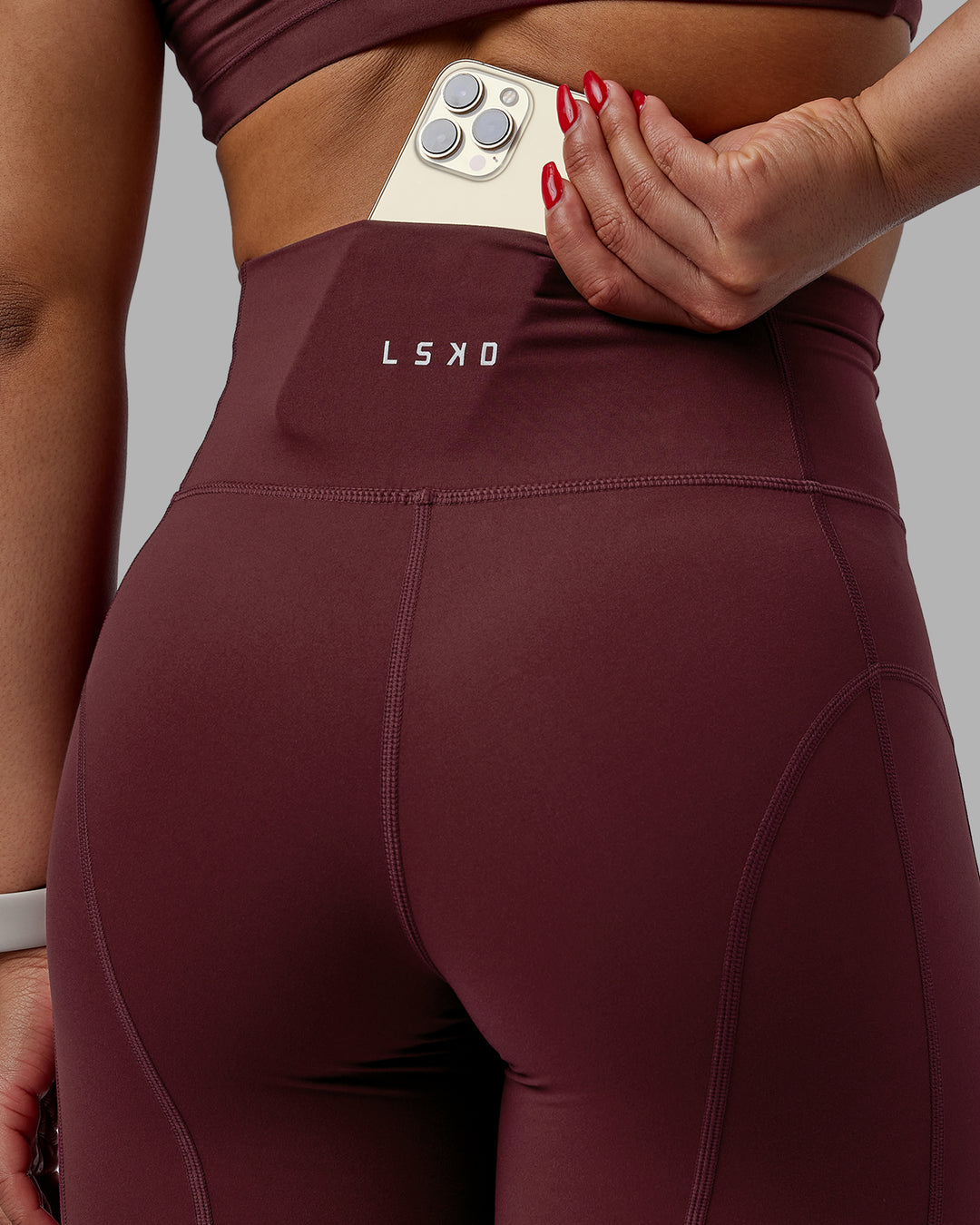 Woman wearing Bend Ultra High-Rise 6" Short - Dark Cherry - view 4