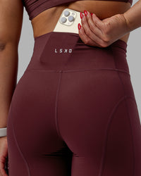 Woman wearing Bend Ultra High-Rise 6" Short - Dark Cherry | Thumbnail Index: 3