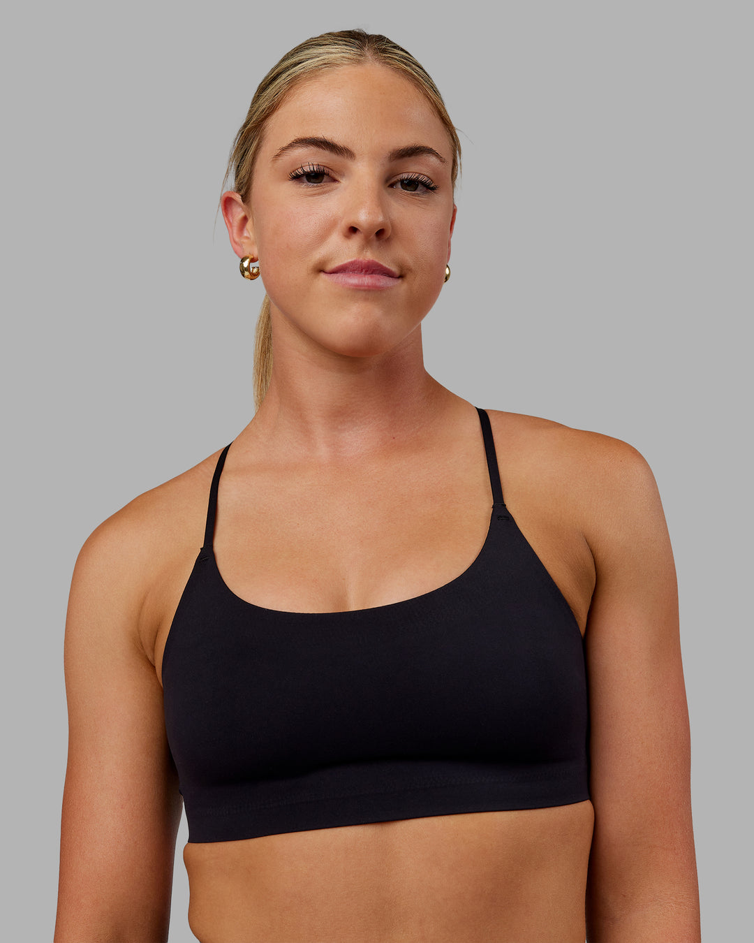 Woman wearing Bonded Sports Bra - Black - view 5