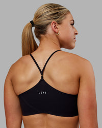 Woman wearing Bonded Sports Bra - Black | Thumbnail Index: 1