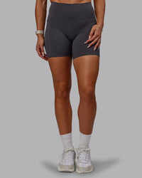 Woman wearing Bree Masters Fusion Ultra High-Rise 6" Short Pockets - Stormy | Thumbnail Index: 5