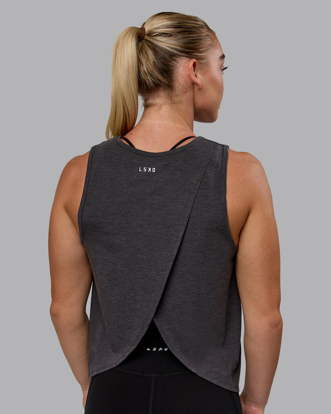 Woman wearing Breeze Training Tank - Black - view 2
