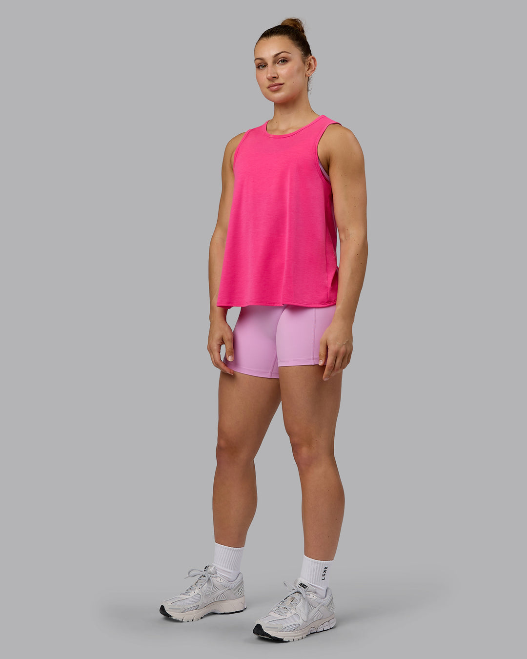 Woman wearing Breeze Training Tank - Ultra Pink - view 8