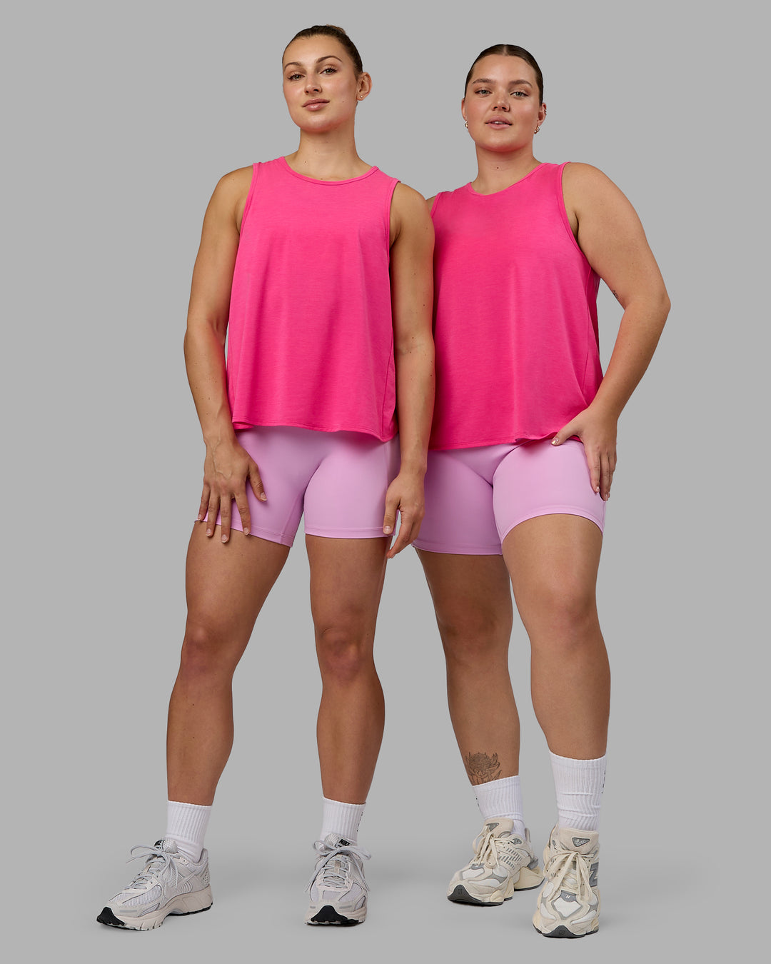 Woman wearing Breeze Training Tank - Ultra Pink - view 7