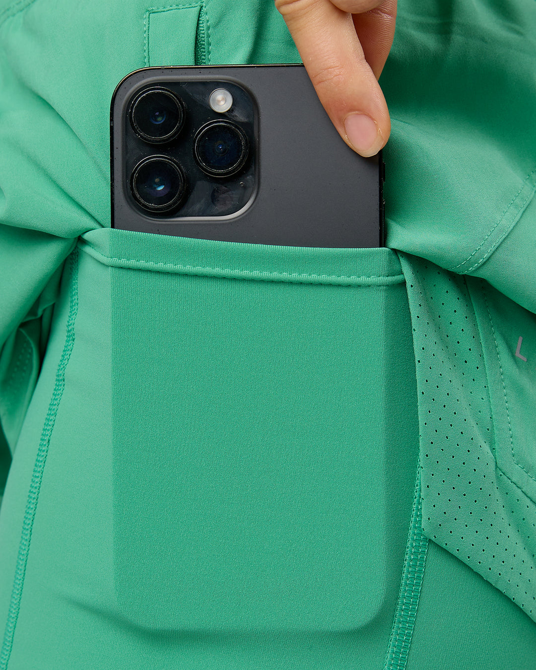 Woman wearing Challenger 5" Lined Performance Shorts - Mystic Green - view 3