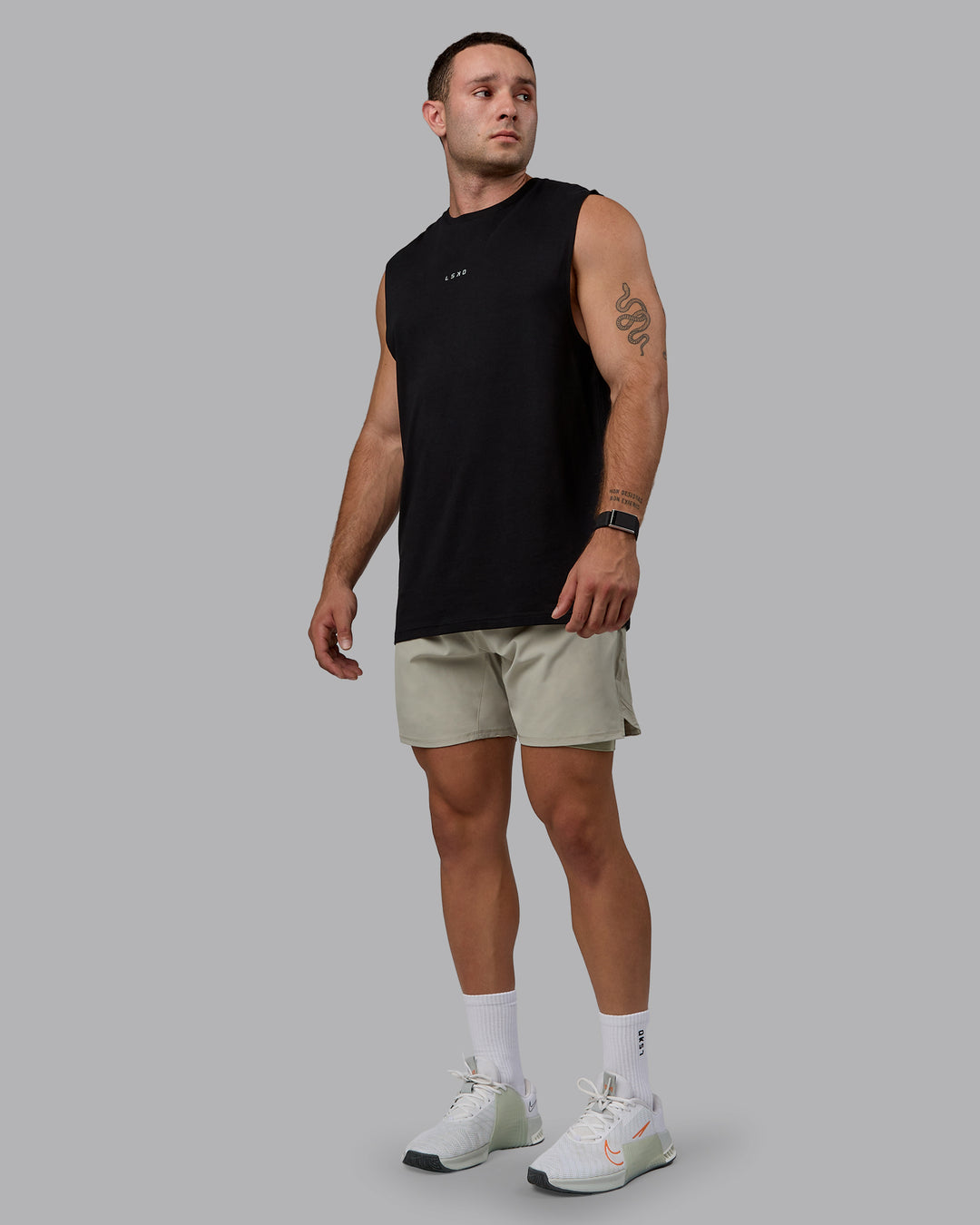 Man wearing Challenger 6" Lined Performance Shorts - Sustained Grey - view 3