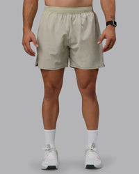 Man wearing Challenger 6" Lined Performance Shorts - Sustained Grey | Thumbnail Index: 7