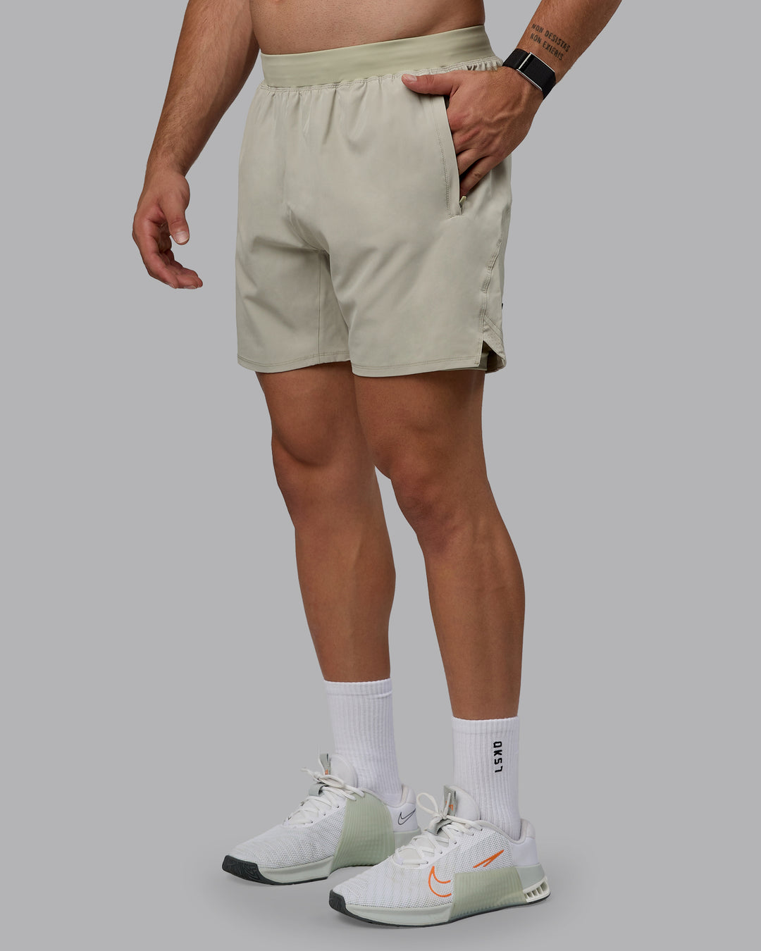 Man wearing Challenger 6" Lined Performance Shorts - Sustained Grey - view 1