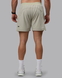 Man wearing Challenger 6" Lined Performance Shorts - Sustained Grey | Thumbnail Index: 3